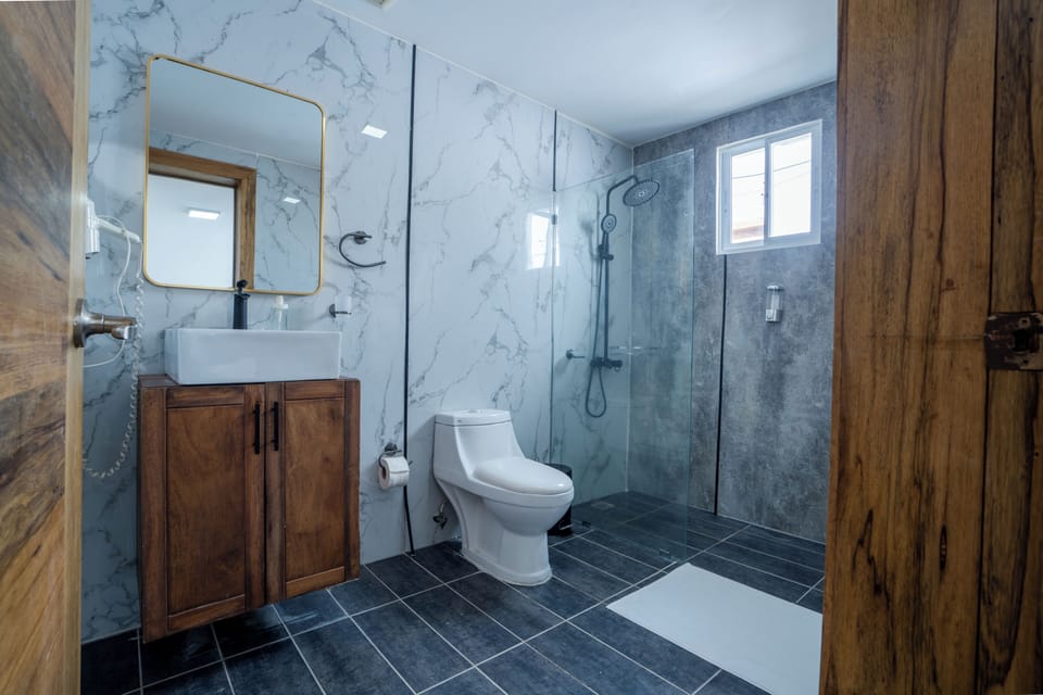 Double Room | Bathroom | Shower, towels, soap, toilet paper