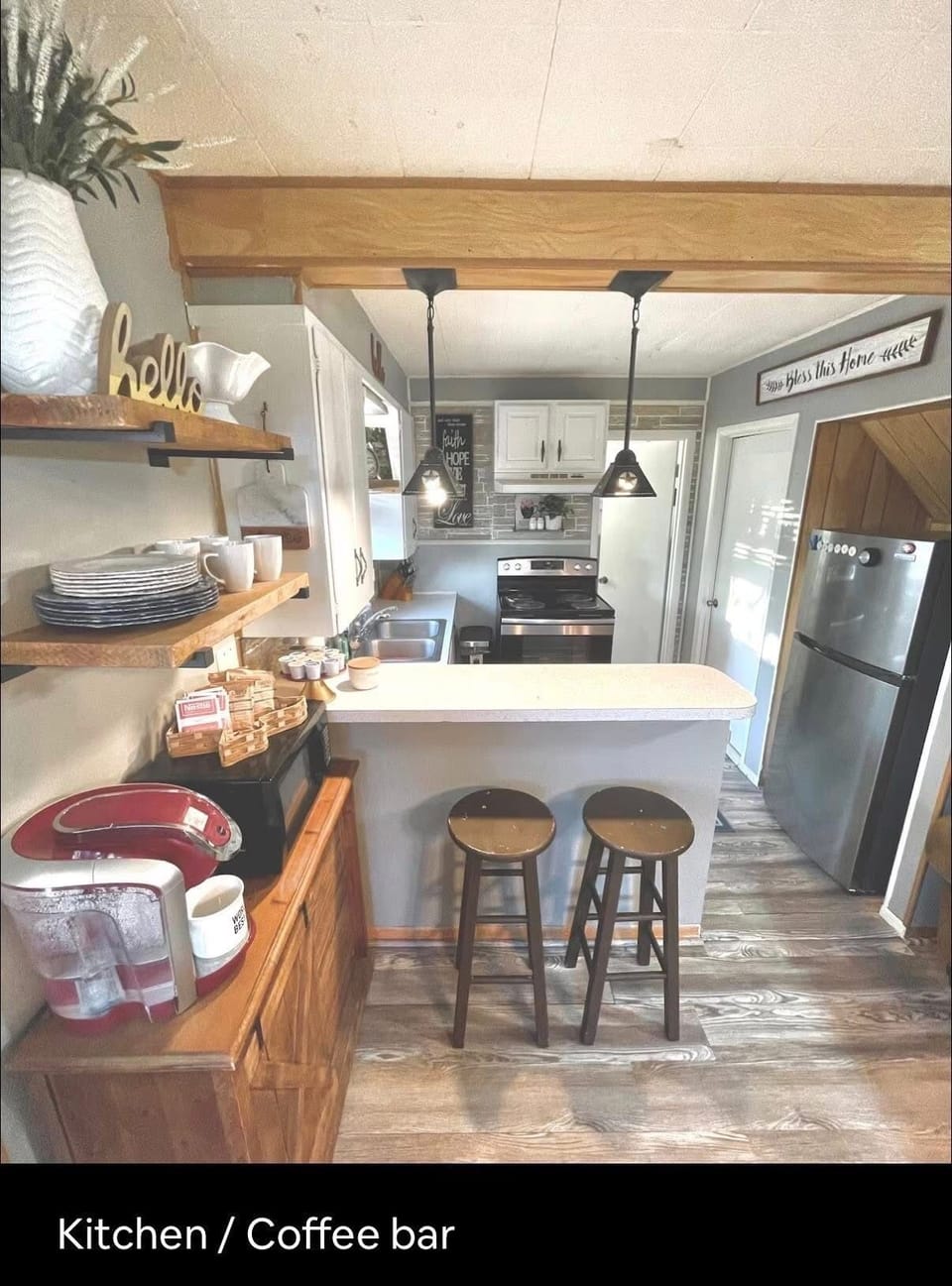 Kitchenette and area for coffee bar, microwave, and toaster. 