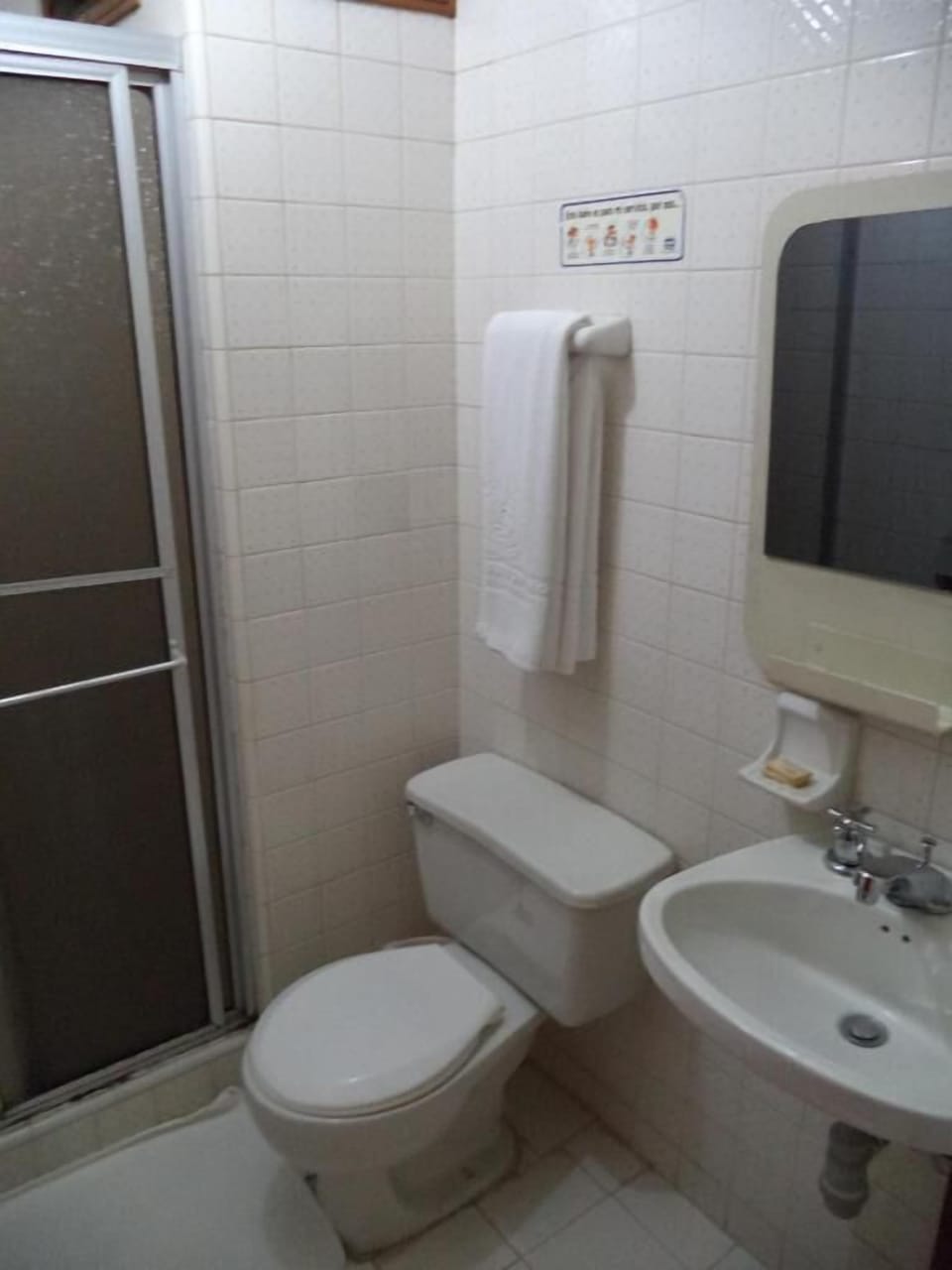 Shower, towels, soap, toilet paper