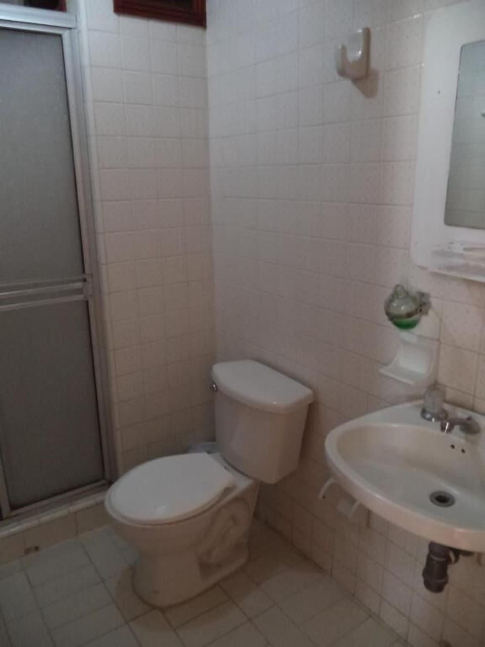 Shower, towels, soap, toilet paper