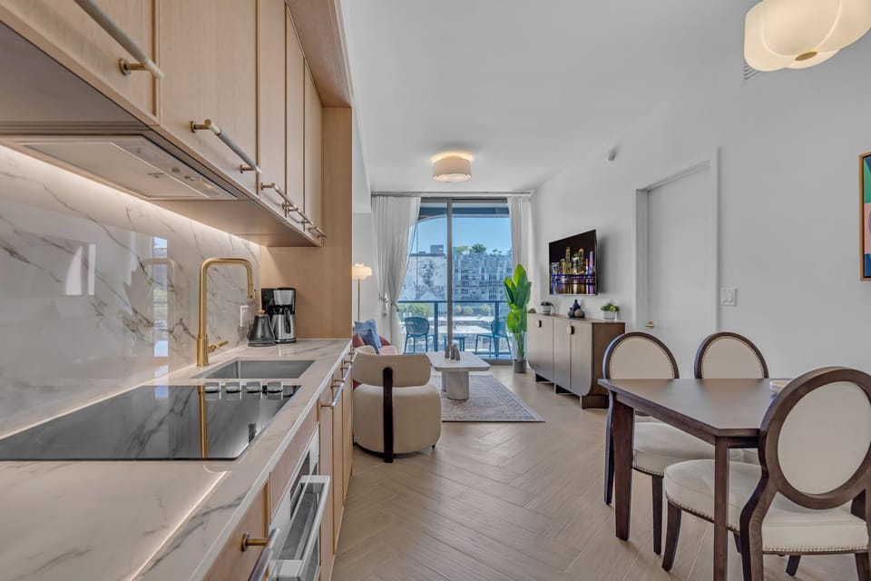 
Elegant dining area with designer chairs and warm wood finishes — a sophisticated space to enjoy your meals together