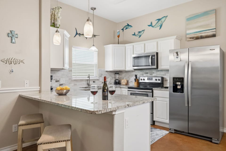 Fully Equipped Kitchen — Granite Counters & Bar Seating for 2