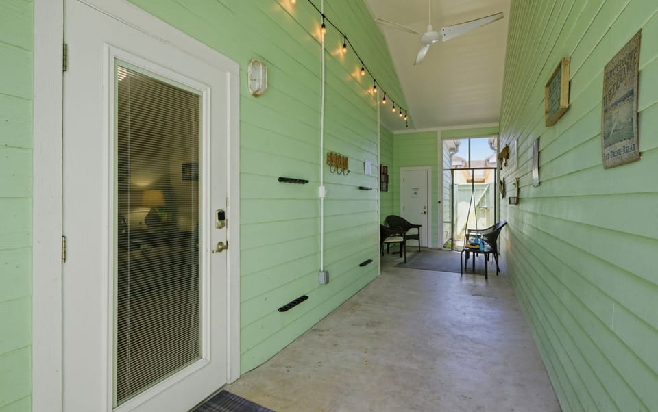 Covered Back Porch — String Lights & Lounge Area