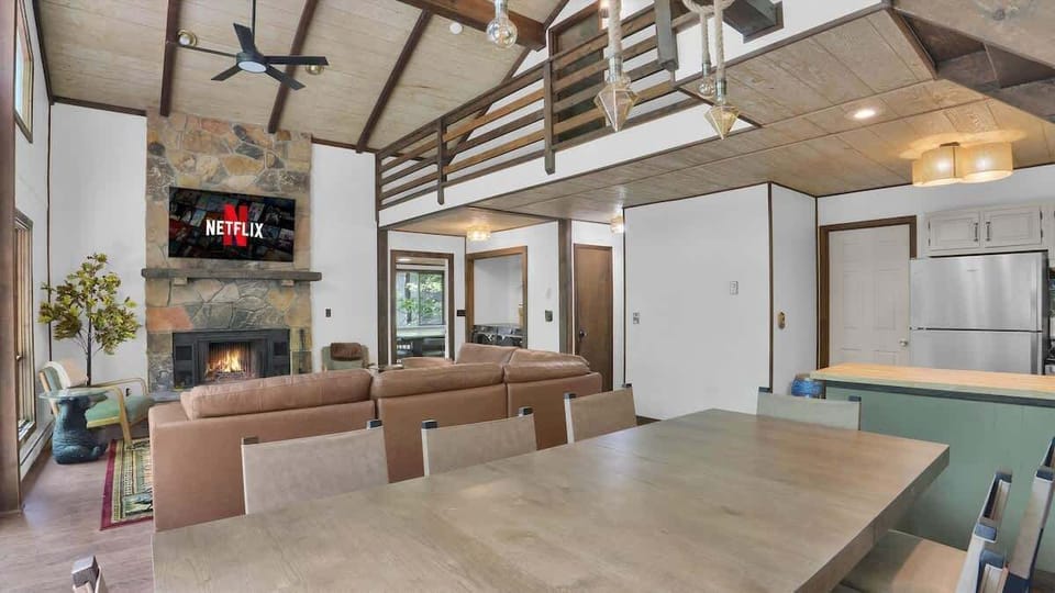 Open Concept Living & Dining Area with Vaulted Ceilings