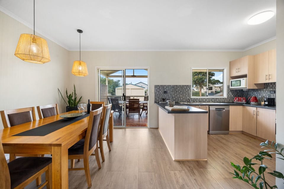Share meals, stories, and slow evenings together around the dining table after exploring the coast.
