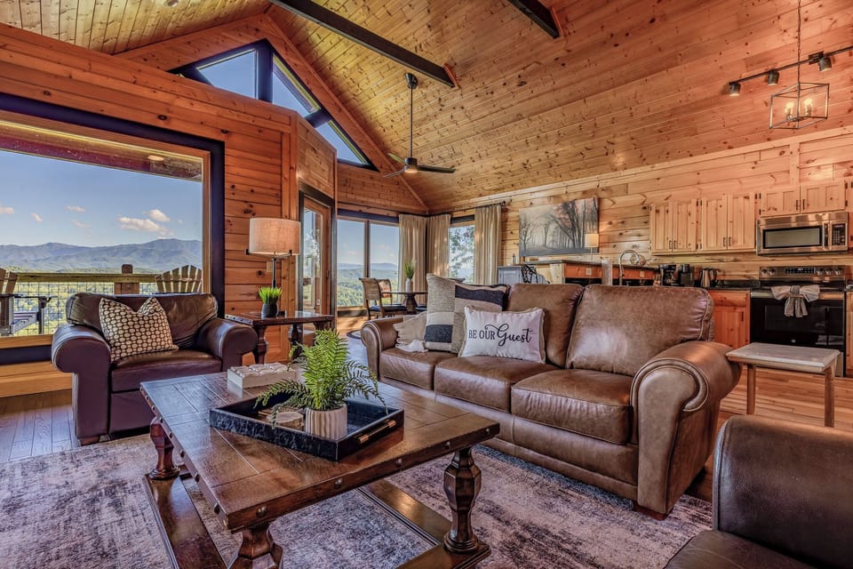 Modern, furniture and decor to compliment the large picture windows, perfectly framing the breathtaking Smoky Mountain Views!