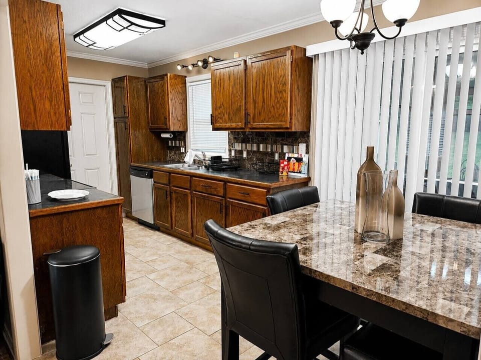 Fully equipped kitchen with dining space for shared meals