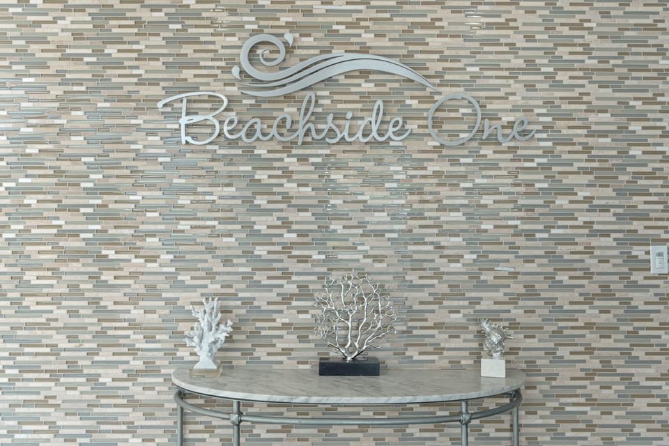 Welcome to Beachside One, a polished beachfront retreat with resort-style amenities and coastal charm.