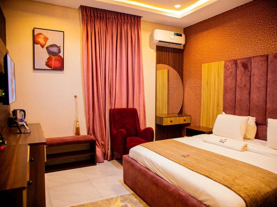 Deluxe Room, Balcony, City View | Desk, laptop workspace, blackout drapes, soundproofing