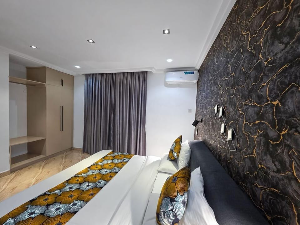 Family Room, Balcony, City View | Desk, laptop workspace, blackout drapes, soundproofing