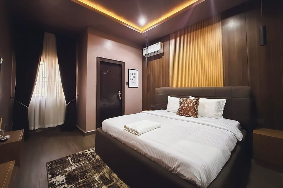 Economy Room, Balcony, City View | Desk, laptop workspace, blackout drapes, soundproofing