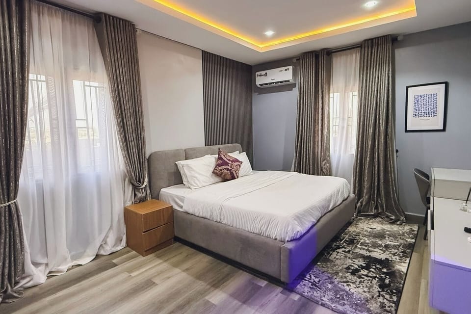 Family Room, Balcony, City View | Desk, laptop workspace, blackout drapes, soundproofing