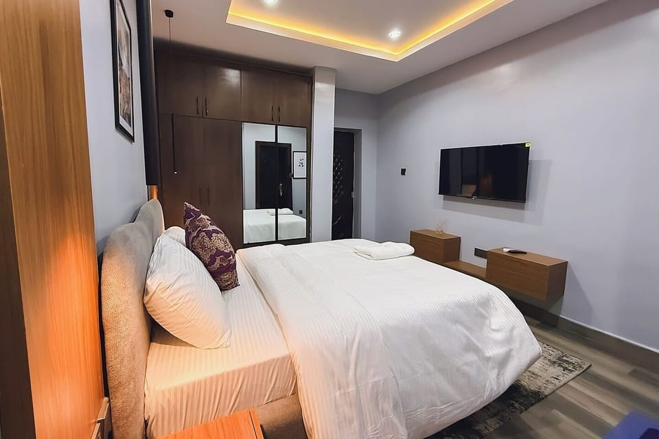 Family Room, Balcony, City View | Desk, laptop workspace, blackout drapes, soundproofing