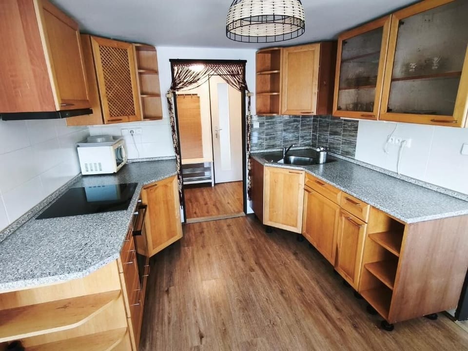 Family Apartment, Hill View | Private kitchen | Highchair