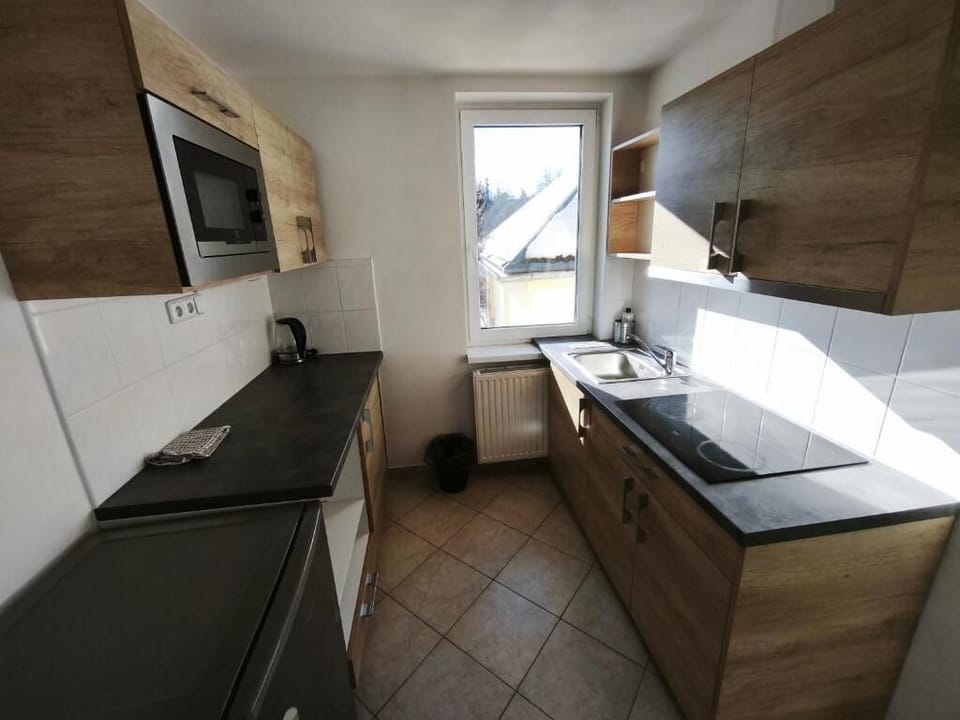 Family Apartment, Valley View | Private kitchen | Highchair