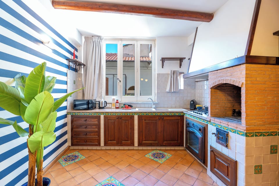 Deluxe Apartment, 2 Bedrooms | Private kitchen | Full-size fridge, microwave, oven, stovetop