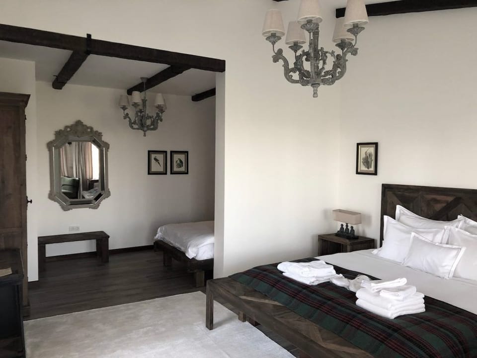 Standard Triple Room, Garden View | Minibar, WiFi (free), bed sheets