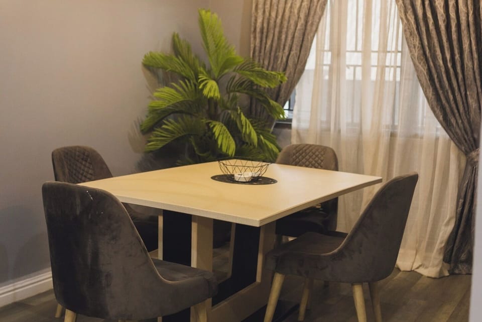 Family Apartment, Balcony, City View | Dining
