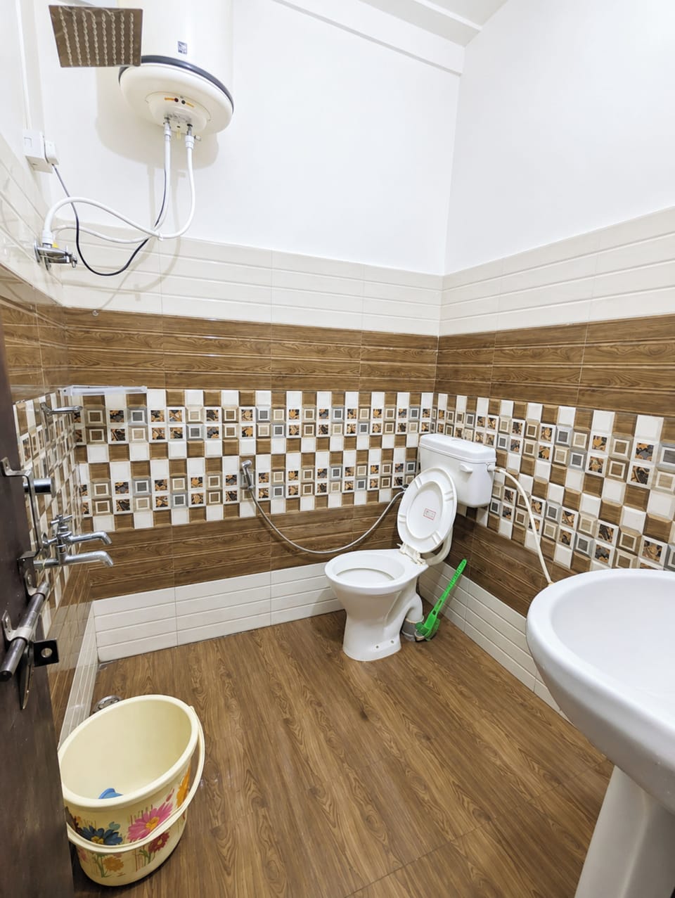 Shower, rainfall showerhead, slippers, towels