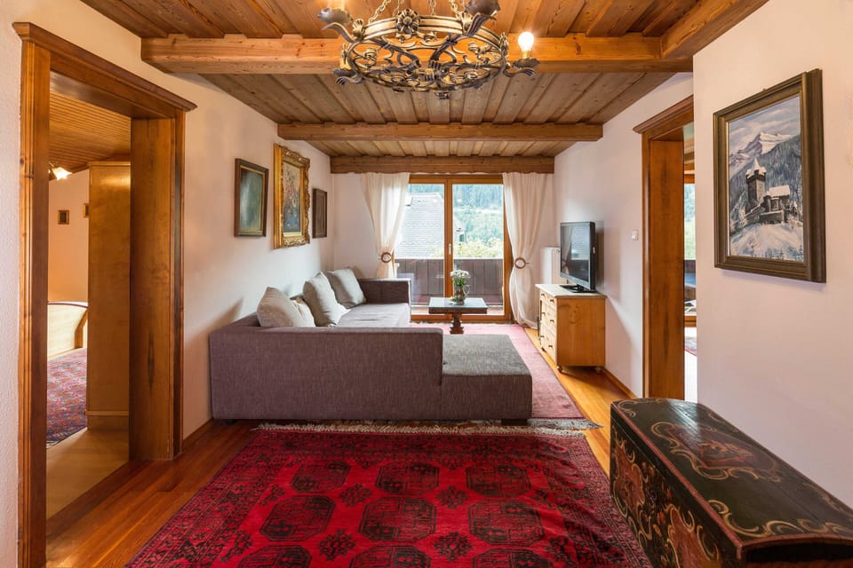 Family Chalet, Mountain View | Living area | Flat-screen TV