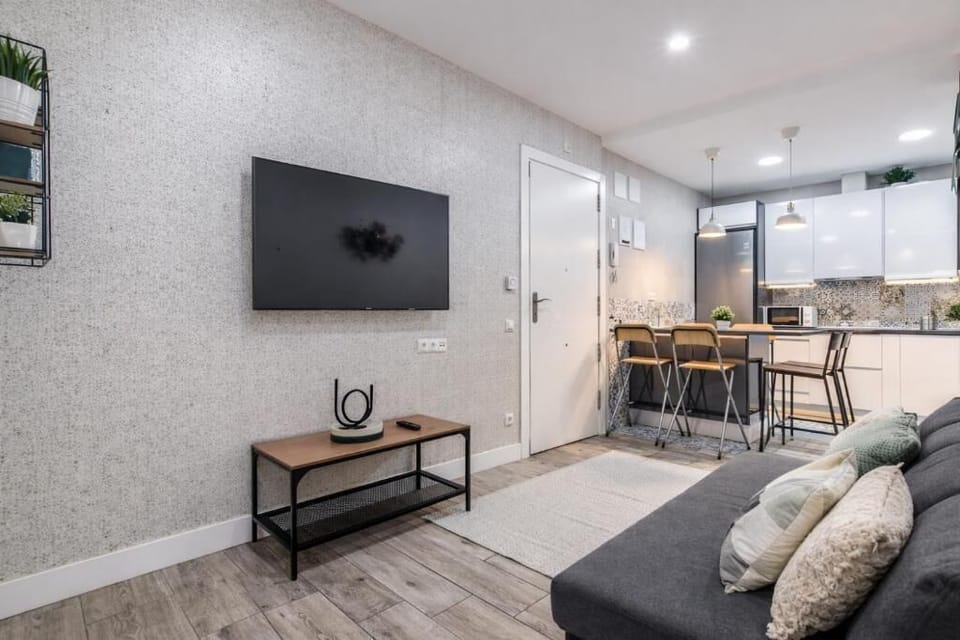 Comfort Apartment | Living area | Flat-screen TV