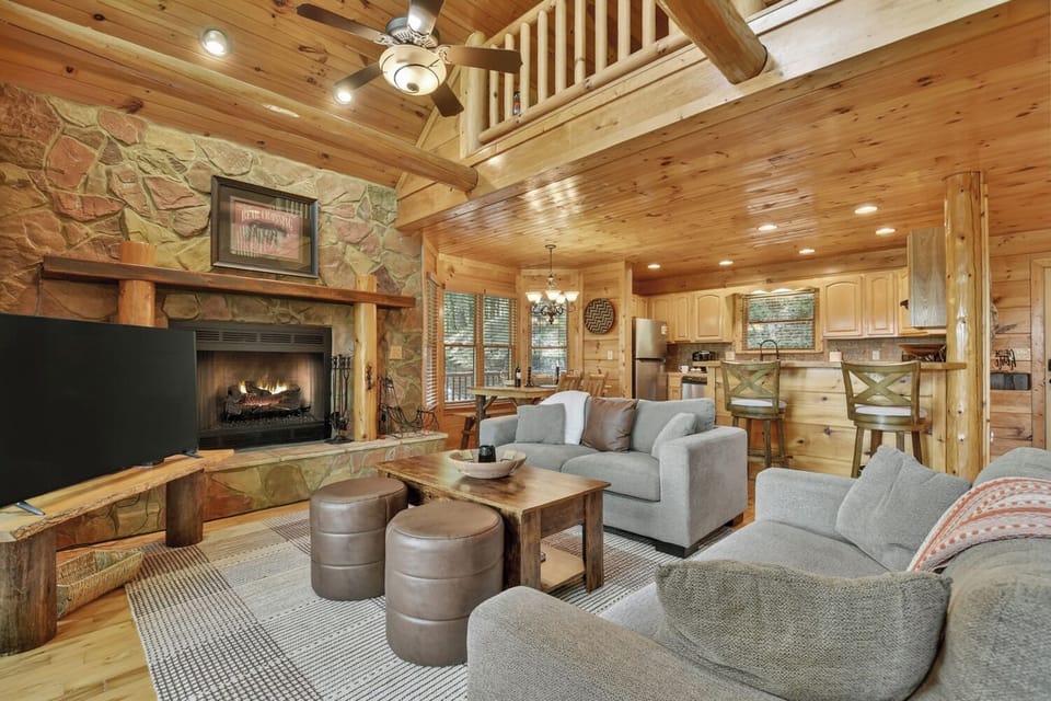 This family cabin rental features an open-concept living space perfect for movie nights and quality time together.