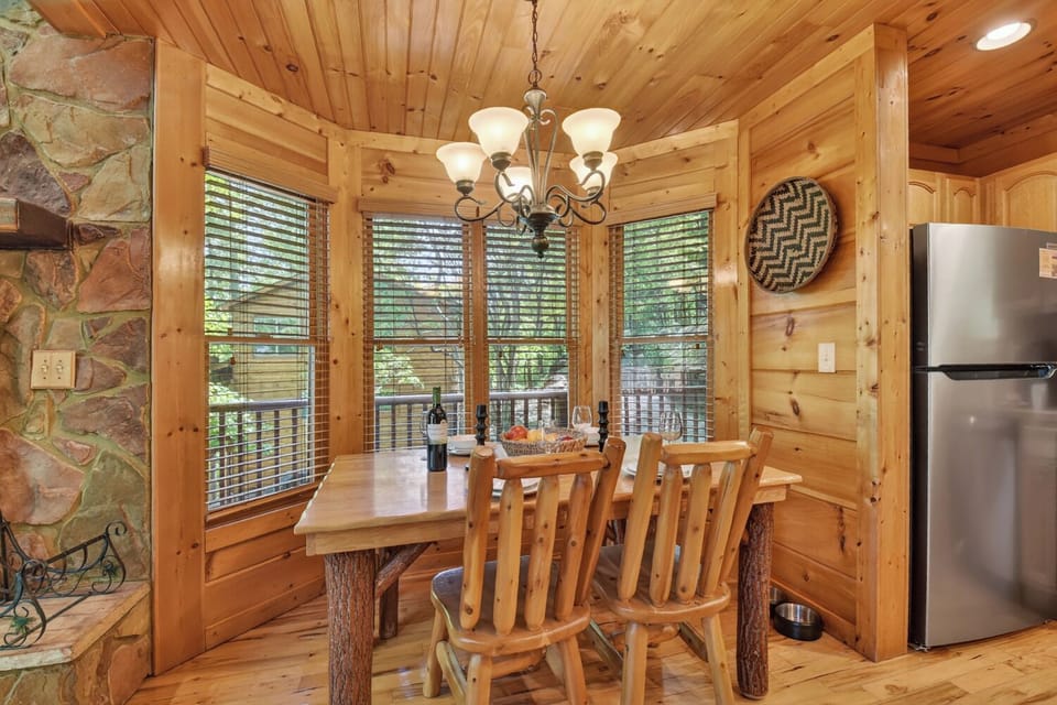 Enjoy meals together at the lovely custom wood dining table 