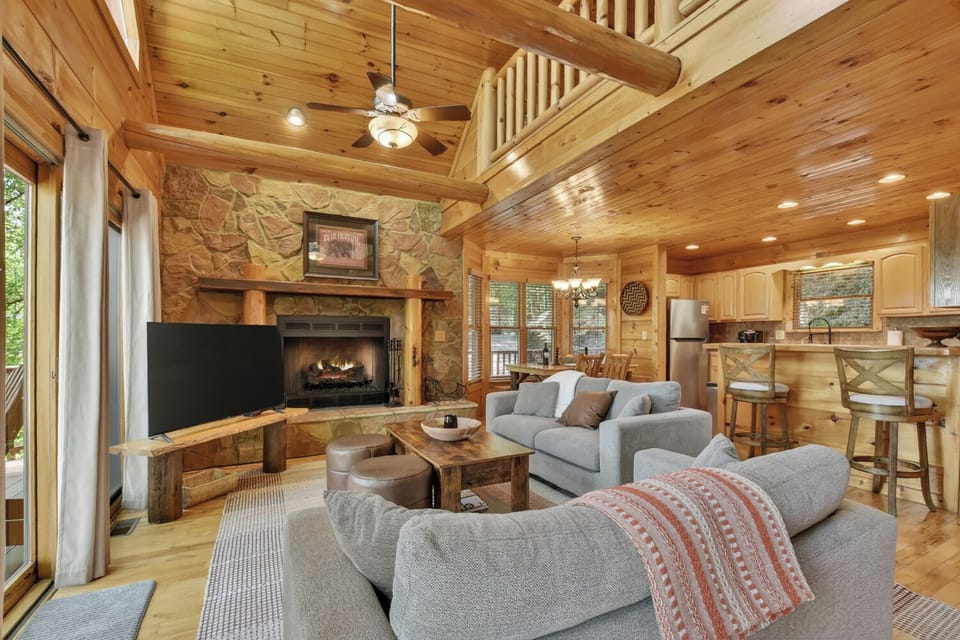 Gather around the true wood-burning fireplace and warm your toes while enjoying a relaxing evening in this Ellijay cabin rental