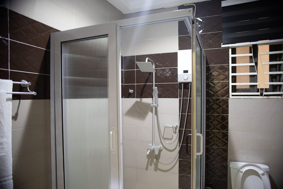 Basic Single Room, Patio | Bathroom | Towels, soap, shampoo, toilet paper