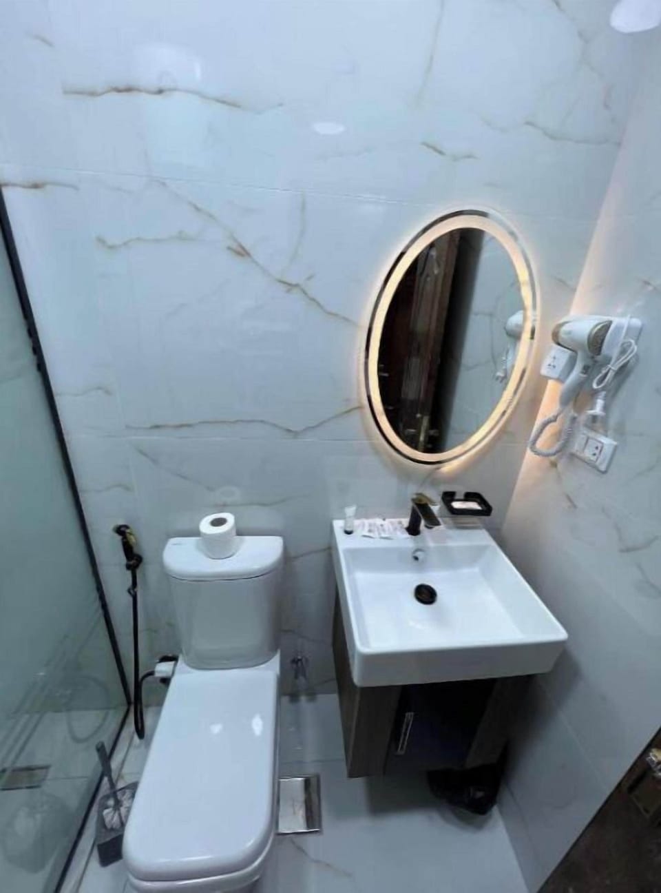 Shower, slippers, soap, shampoo