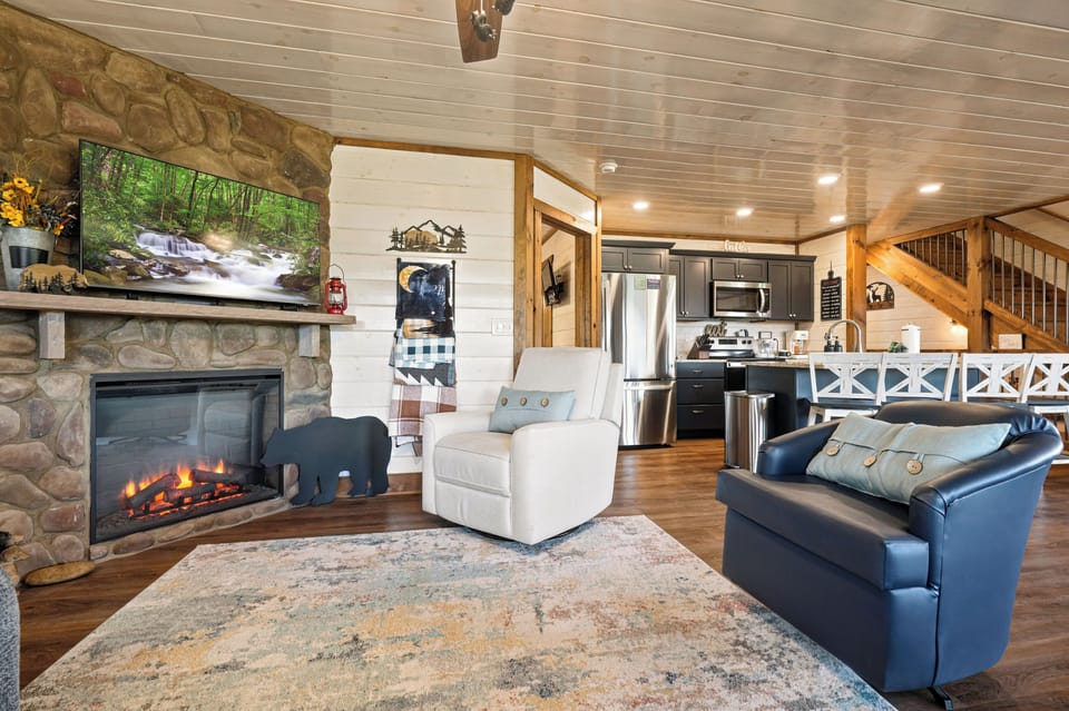 Living room with TV and electric fireplace