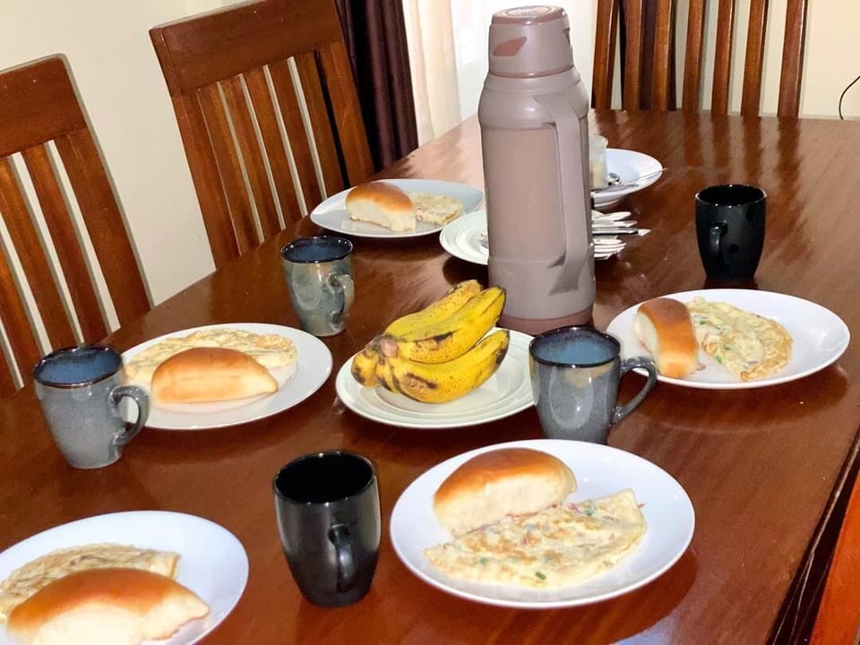 Double Room, Private Bathroom, City View | Breakfast meal | Free daily continental breakfast