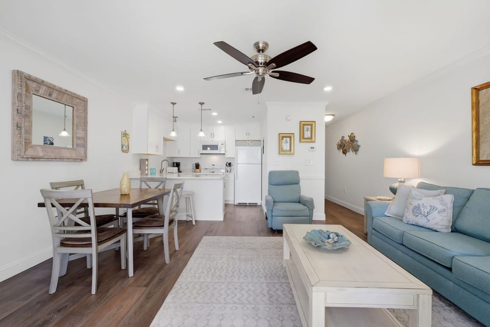 Grand Caribbean 305W- Relax in your open living area with coastal accents, a cozy dining spot, and a well-equipped kitchen—everything you need to unwind after a day of adventure.