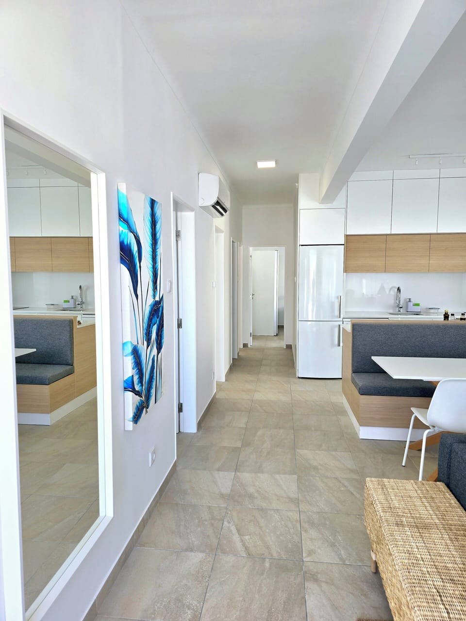 View from entrance into living room/dining/kitchen.