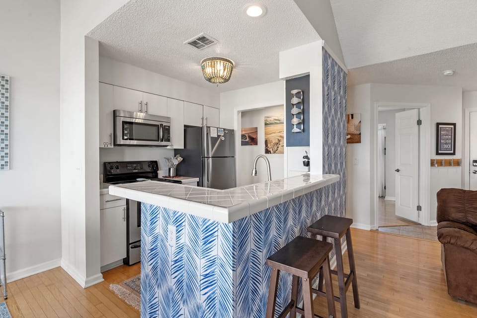 PC631: Coastal Cool | Living Area Into Kitchen