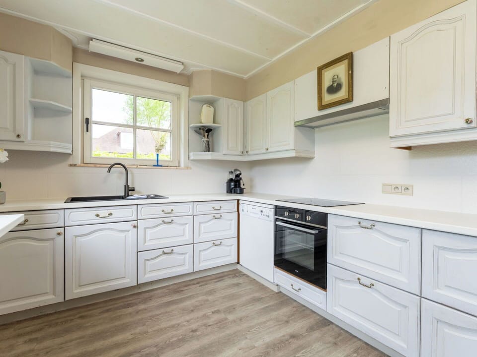 Flooring, Cabinetry, Wood, Interior Design, Kitchen, Floor, Drawer, Countertop, Home, Cupboard
