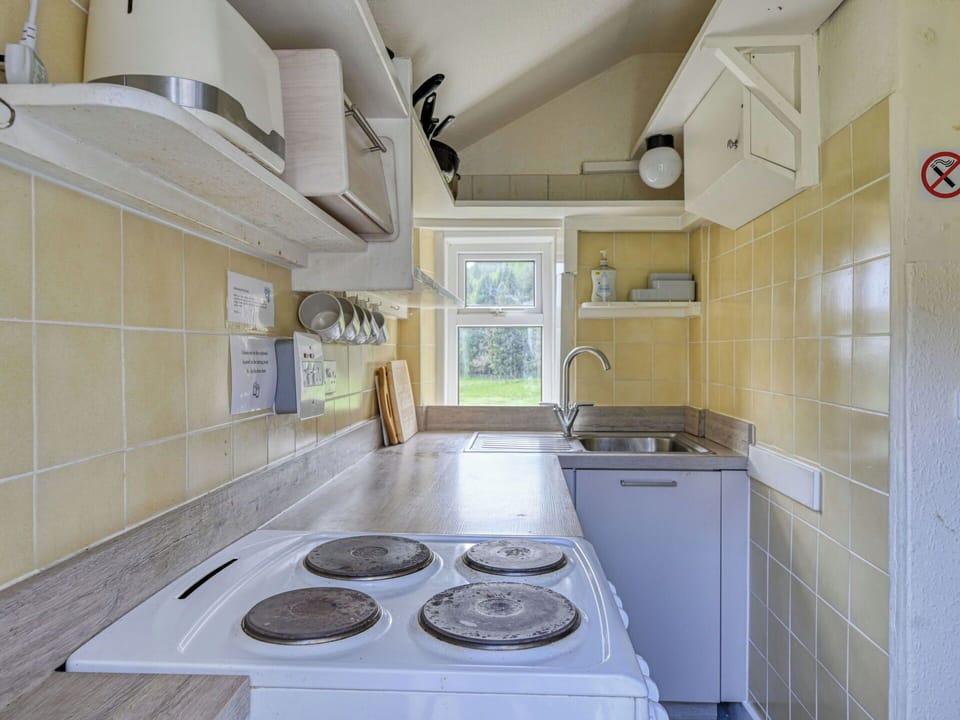 Kitchen, Major Appliance, Flooring, Kitchen Appliance, Countertop, Interior Design, Floor, Kitchen Sink, Ceiling, Plumbing Fixture