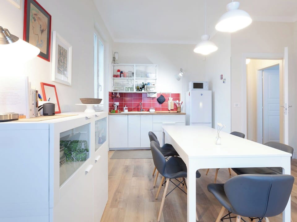 Furniture, Interior Design, Flooring, Floor, Kitchen, Cabinetry, Light Fixture, Ceiling, Wood, Chair