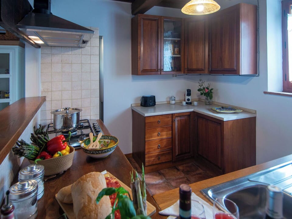 Furniture, Kitchen, Countertop, Kitchen Appliance, Interior Design, Wood, Cabinetry, Major Appliance, Flooring, Ceiling
