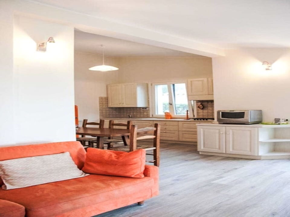 Furniture, Interior Design, Flooring, Floor, Wood, Ceiling, Room, Couch, Lighting, Apartment