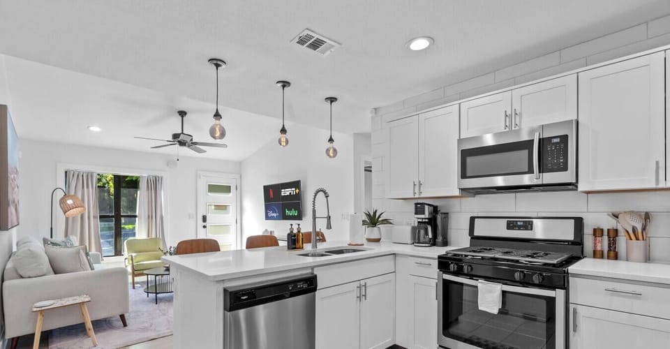The open floor plan flows from kitchen to living room, keeping everyone in the conversation.