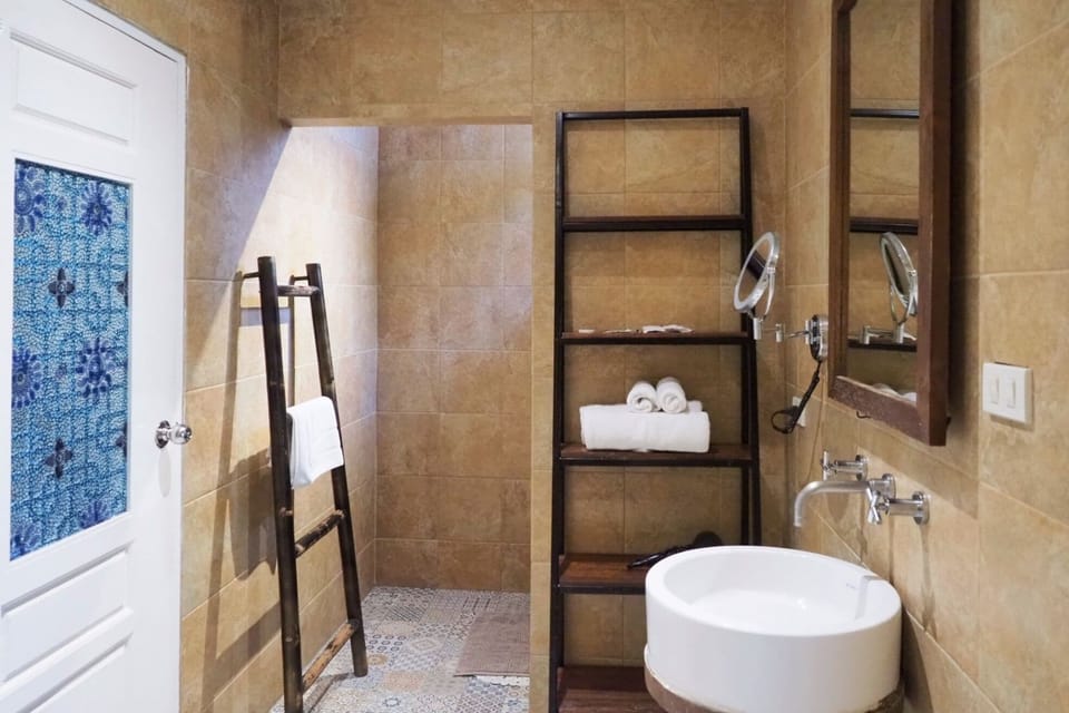 Garden View | Bathroom | Shower, free toiletries, hair dryer, bathrobes