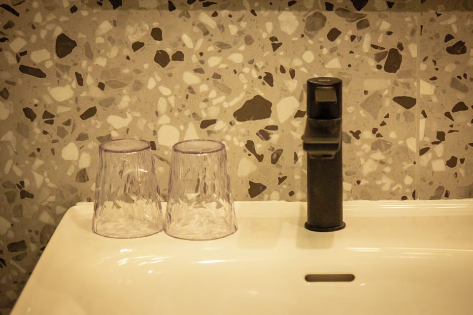 Shower, eco-friendly toiletries, hair dryer, towels