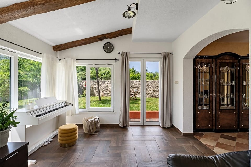 Fully air-conditioned ground floor with doors to the garden.