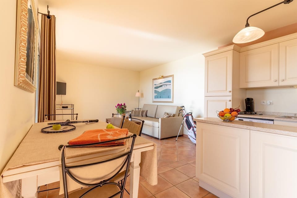 A fully equipped kitchen and dining area — everything you need to cook and gather together.
