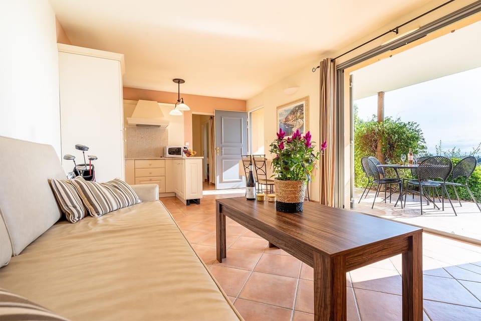 Sun-drenched living and dining space that flows effortlessly to the outdoors.