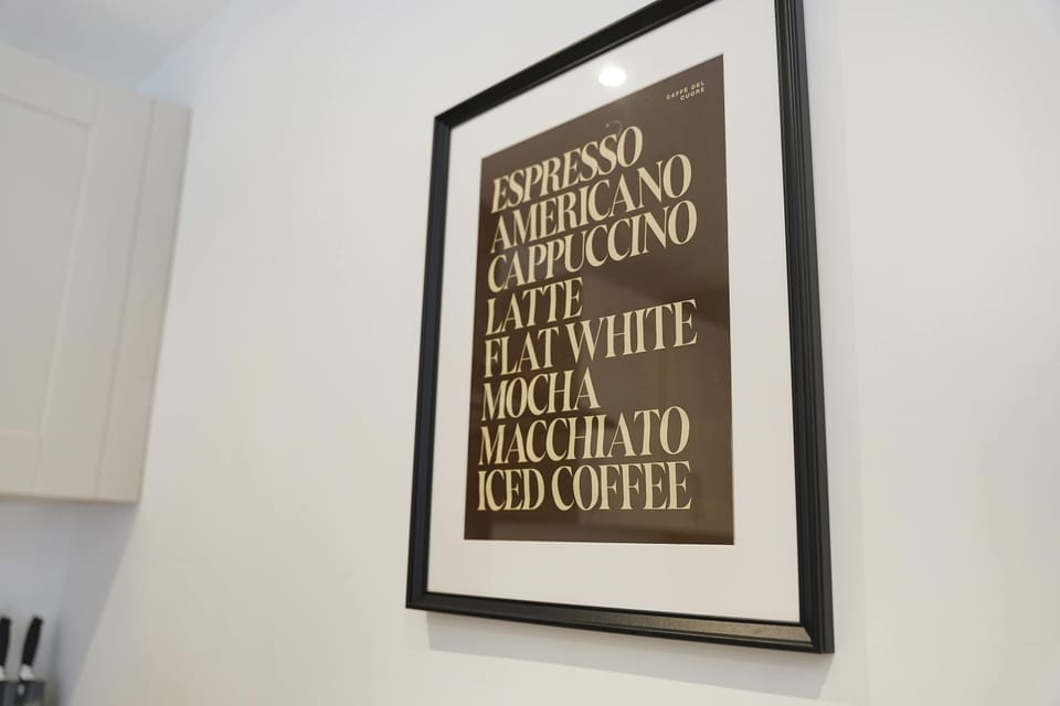 Framed artwork and simple decorative touches add character to this comfortable space. Combined with soft furnishings and a calm layout, the room feels welcoming and well suited for short or extended stays alike.