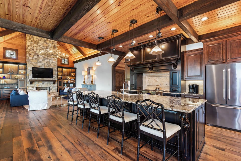 Kitchen with large island bar and seating for 5