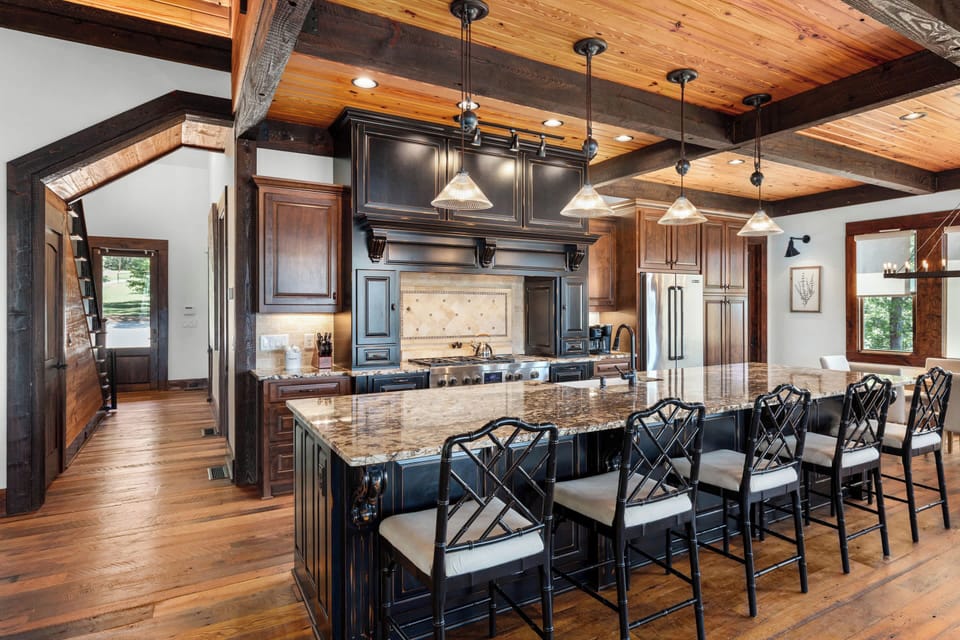 Kitchen with large island bar and seating for 5