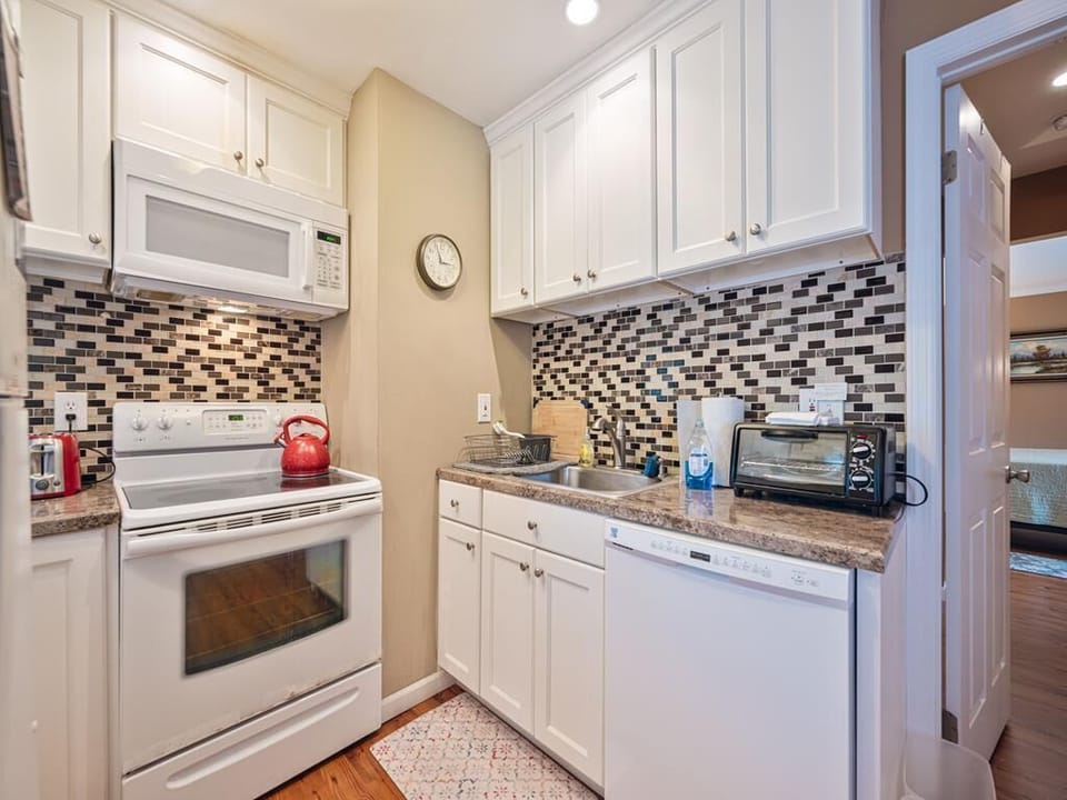 Enjoy the convenience of a well-appointed kitchen, where cooking feels effortless and inviting.